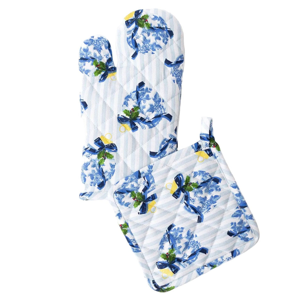 White oven mitt and potholder set with blue chinoiserie pattern, ribbons, and yellow accents