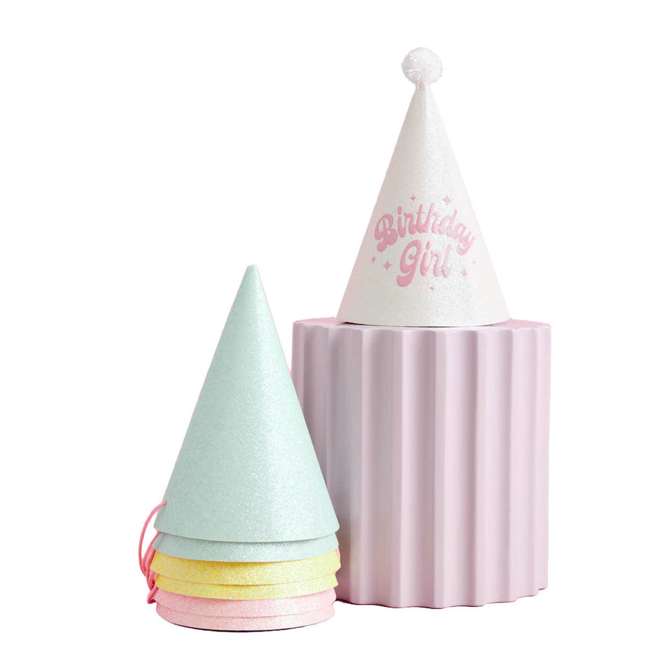 Pastel glitter paper party hats set with white Birthday Girl cone hat and colorful tiered hat