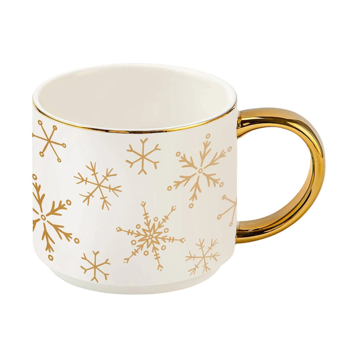 Gold Snowflakes Coffee Mug with white ceramic body and gold handle on white background