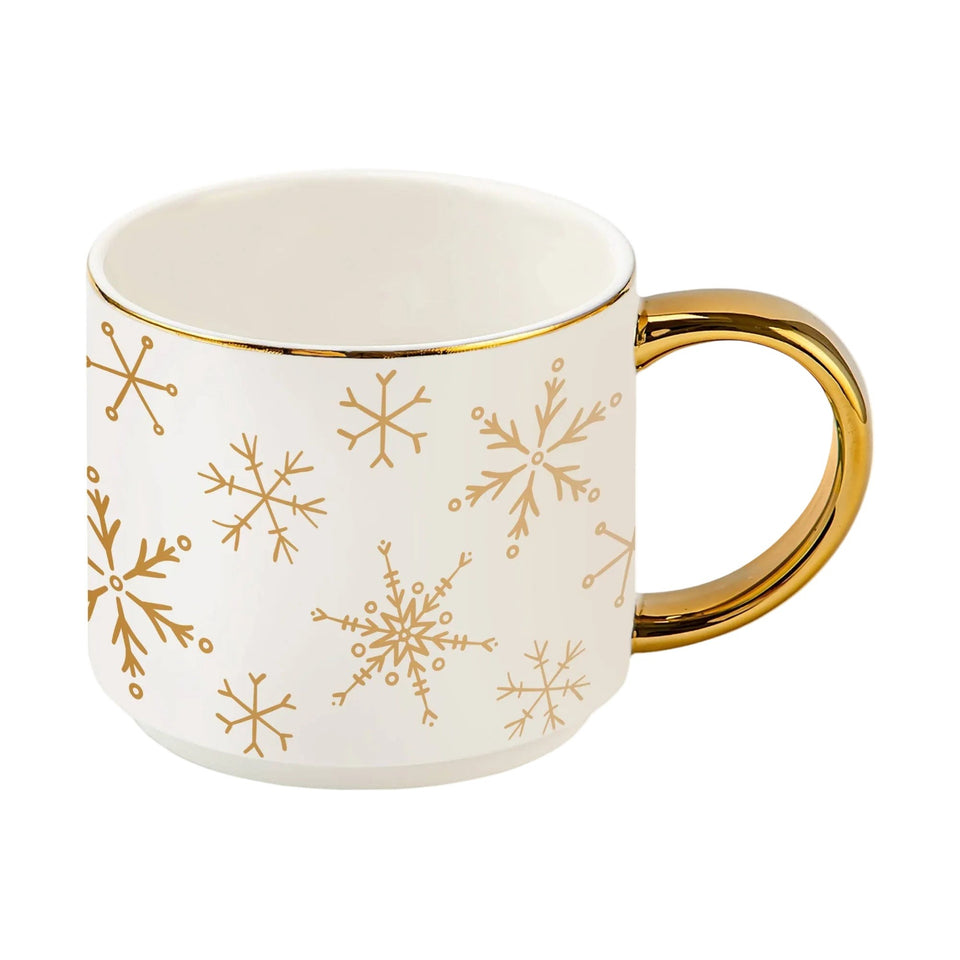 Gold Snowflakes Coffee Mug with white ceramic body and gold handle on white background