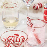 Peppermint Twist glasses with candy cane stirrers in festive holiday cocktail scene