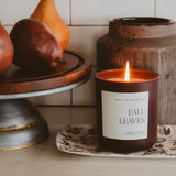 Fall Leaves soy candle displayed in autumn home décor setting with pears and ceramic vessels
