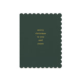 Green scalloped-edge Christmas card with gold foil text reading 'merry christmas to you and yours'