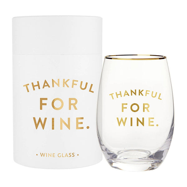 Stemless wine glass with gold 'Thankful For Wine' text and matching white gift box packaging