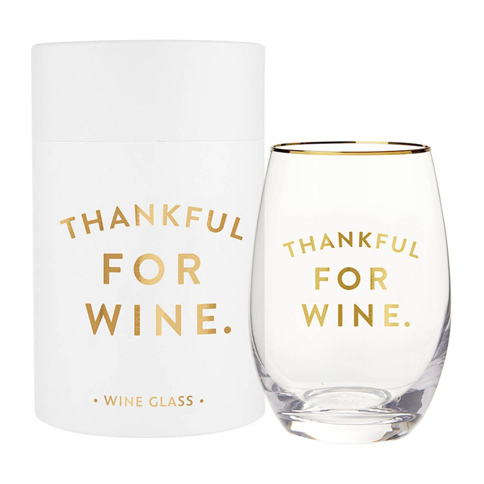 Stemless wine glass with gold 'Thankful For Wine' text and matching white gift box packaging