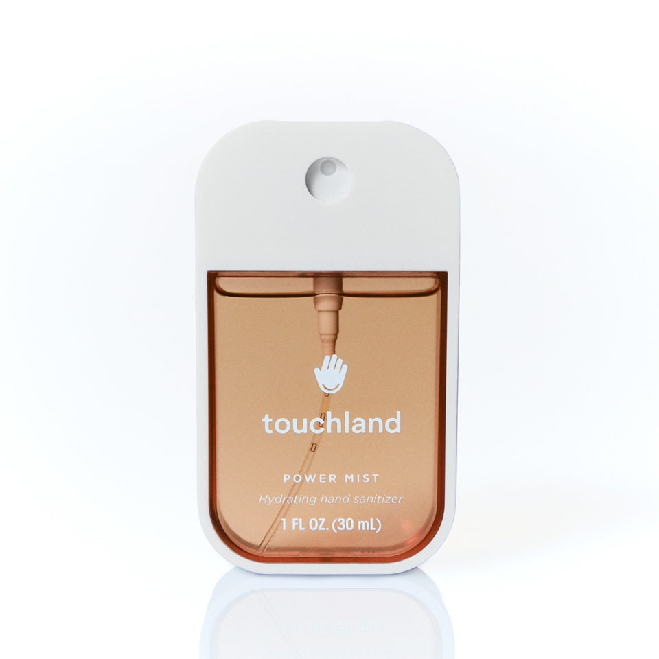 Touchland Power Mist hand sanitizer in Salted Caramel, 1 FL OZ bottle on white background