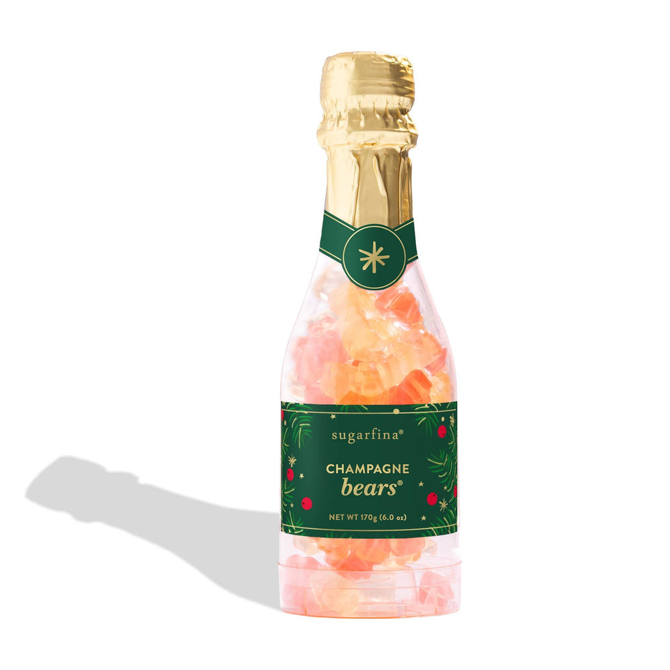 Sugarfina Champagne Bears in a decorative celebration bottle with gold foil top and green holiday label