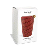 Tea Forte Warming Joy red steeping cup with infuser and gold handle detail