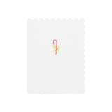 Christmas card with red and white candy cane and yellow bow illustration on white scalloped background