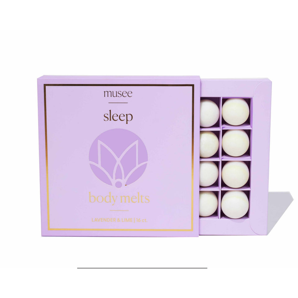 MUSEE Sleep Body Melts in lavender and linen scent with 8 white wax melts displayed in purple packaging