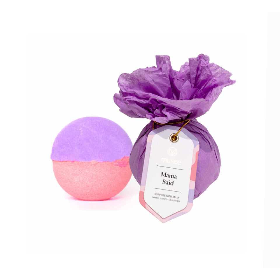 MUSEE Mama Said bath balm in purple and pink with tissue paper wrapping and label tag