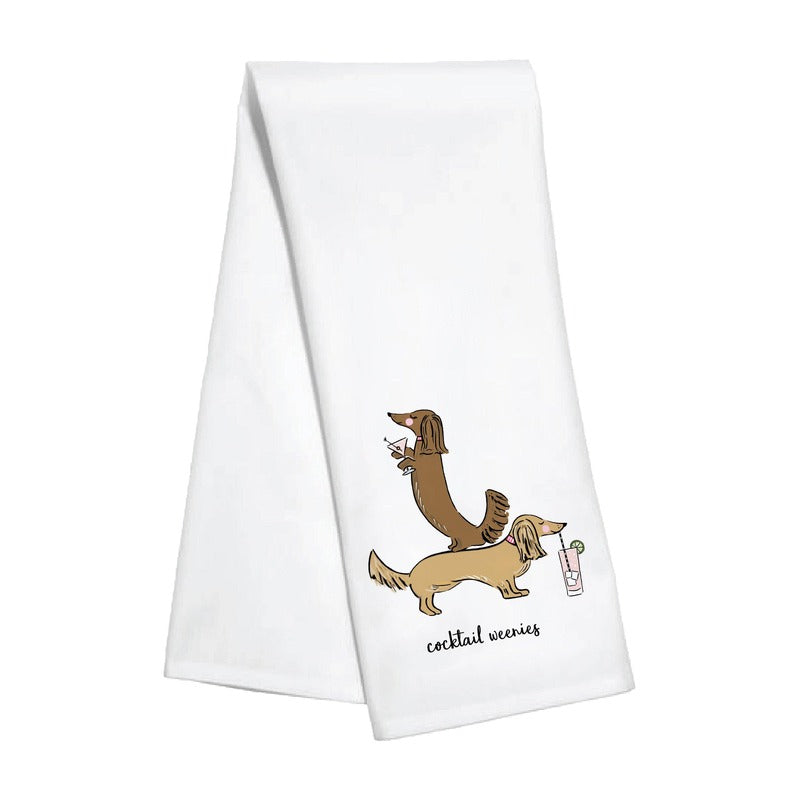 White kitchen towel with illustrated dachshunds and 'cocktail weenies' text design
