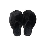 Black faux fur jumbo slippers for women shown from above on white background