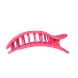TELETIES Flat Round Tropic Twist Large hair clip in hot pink with ventilation slots on black background
