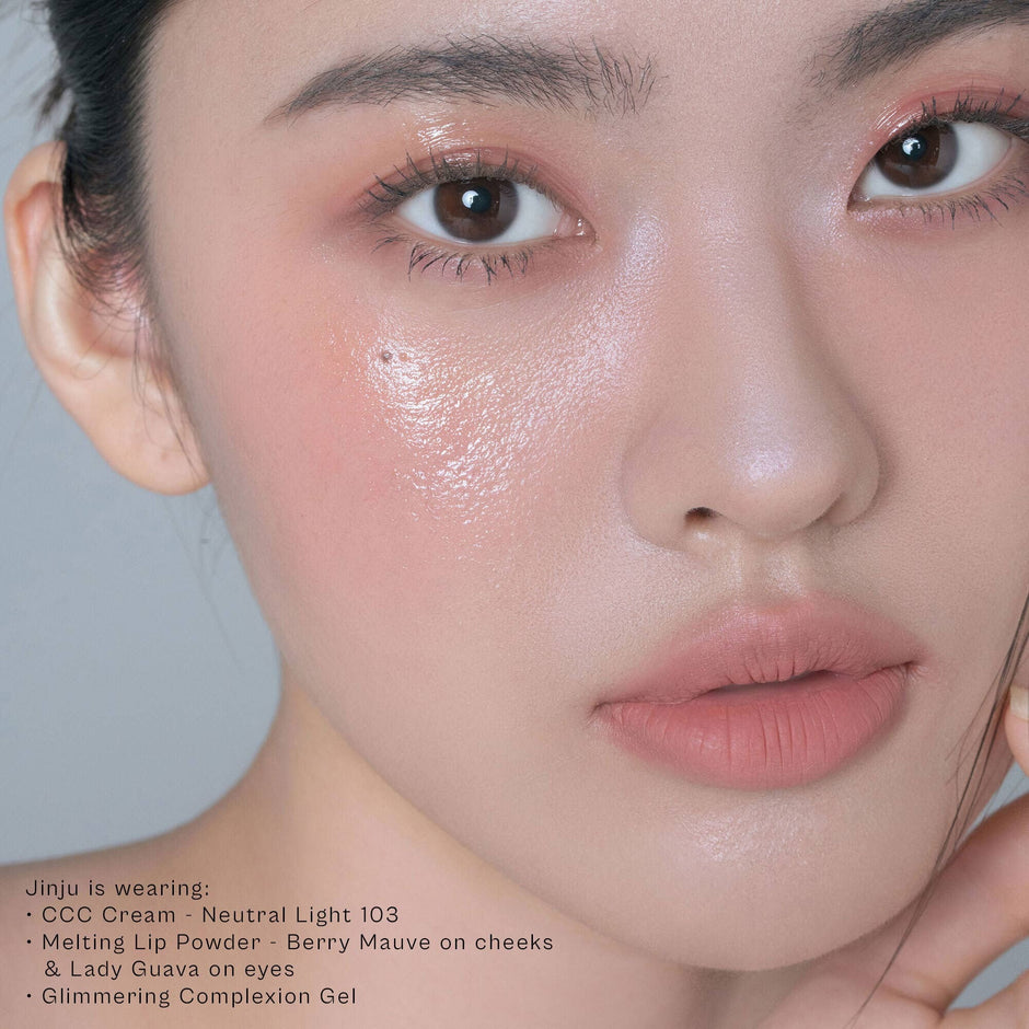 Glimmering Complexion Gel applied for dewy, luminous skin finish on model face