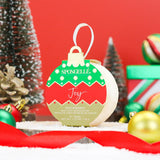 Spongellé Joy Snowberry Holiday Ornament body wash infused buffer hanging among holiday decorations