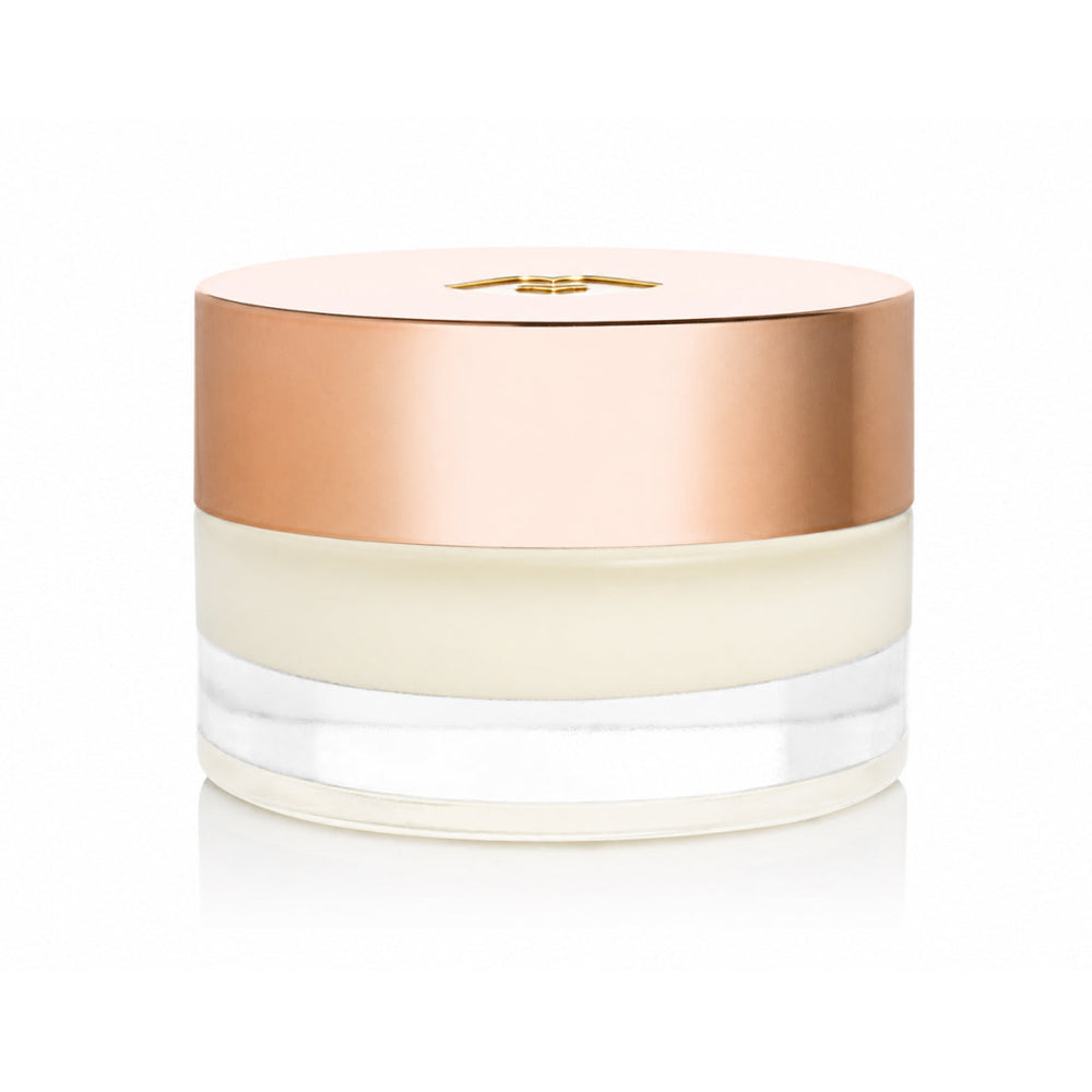 Sara Happ Dream Slip Overnight Lip Mask jar with a rose gold lid and creamy balm in a clear glass base