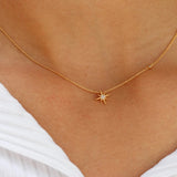tai-rittichai-starburst-pendant-necklace-gold-on-model
