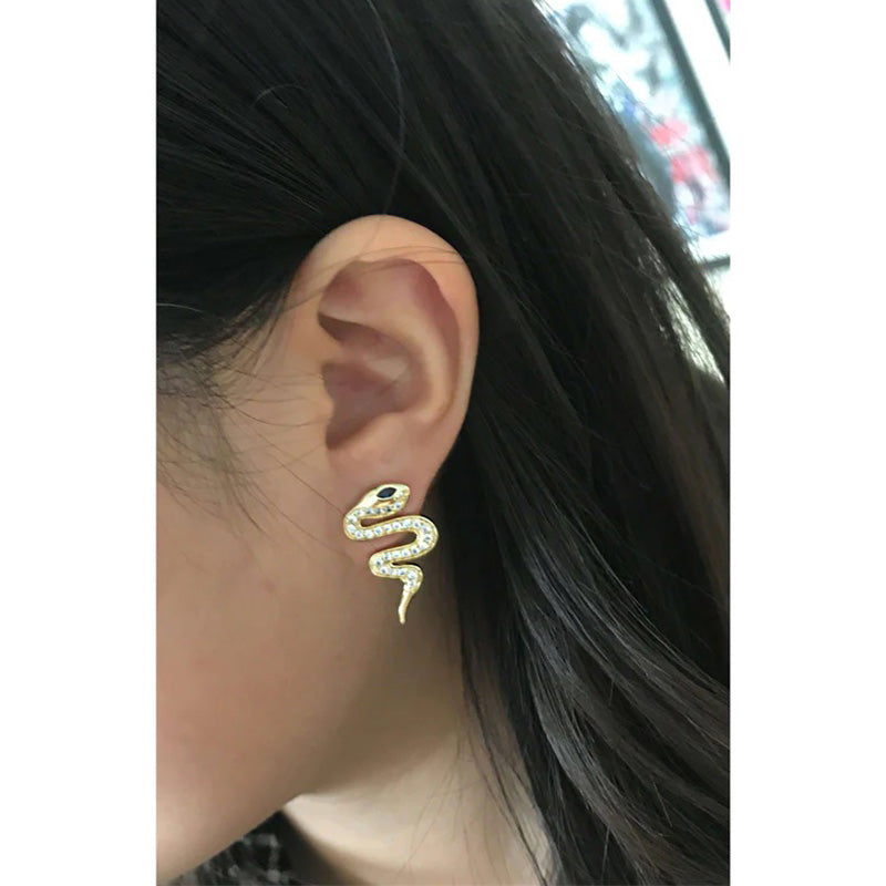 melinda-maria-snake-pave-stud-earrings-gold-on-model