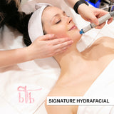 A person receiving a Signature HydraFacial treatment at a beauty bar, with the belle & blush logo visible on the image.